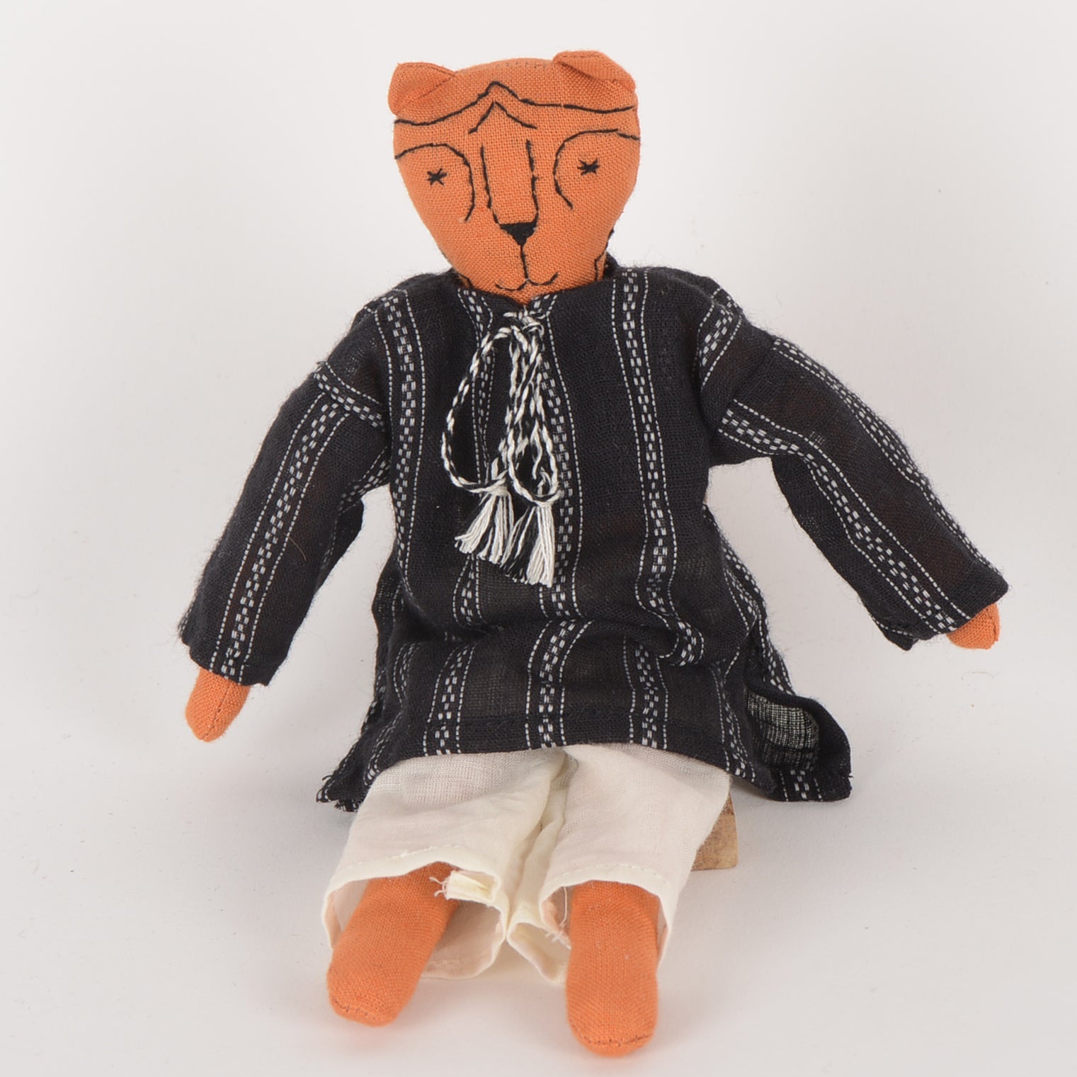 Djour Mini — The Tiger, a handcrafted cotton doll with woollen hair, featuring a charming design and eco-friendly materials.