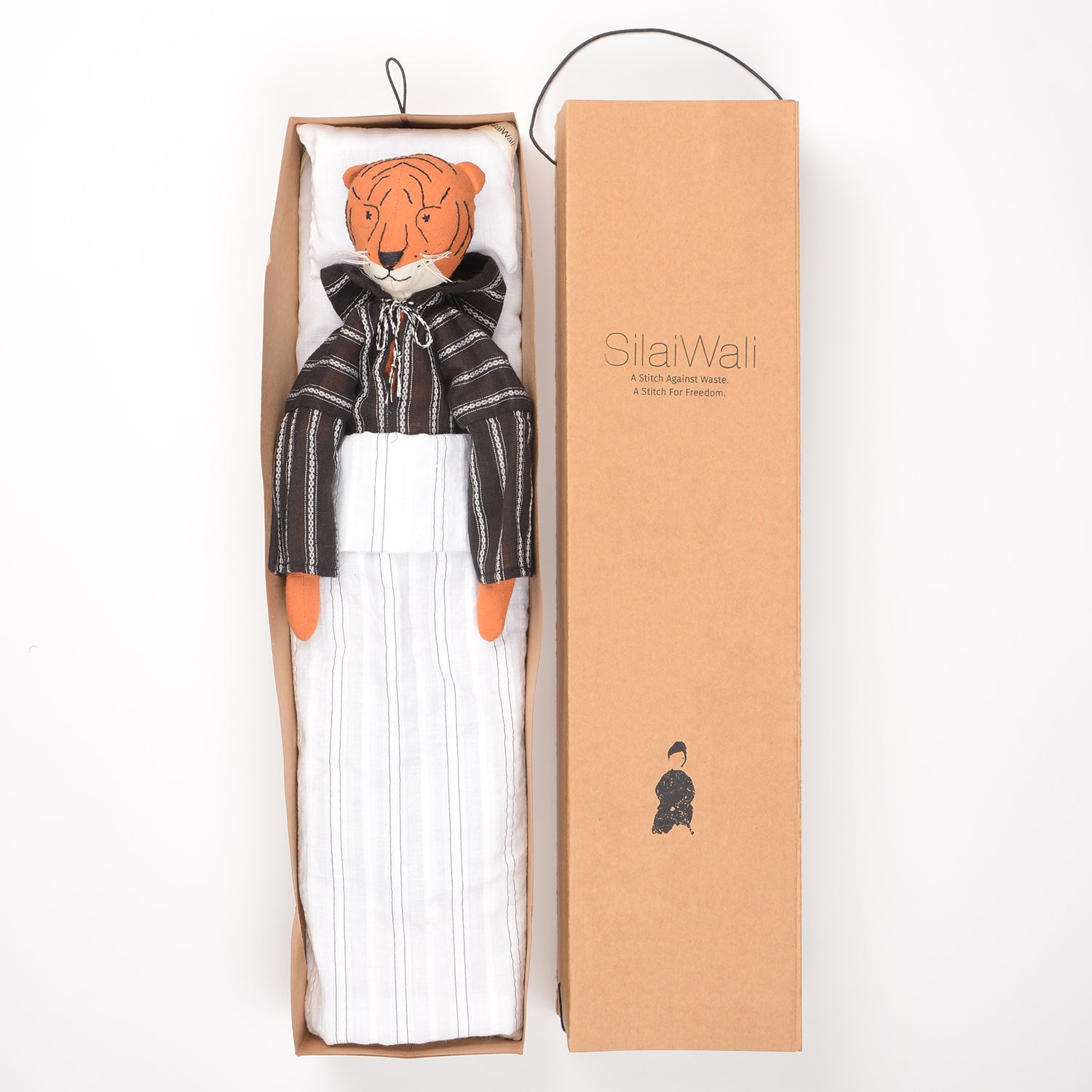 Djour the Tiger handcrafted cotton doll with woollen hair, featuring vibrant colors and a foldable box for bedding.