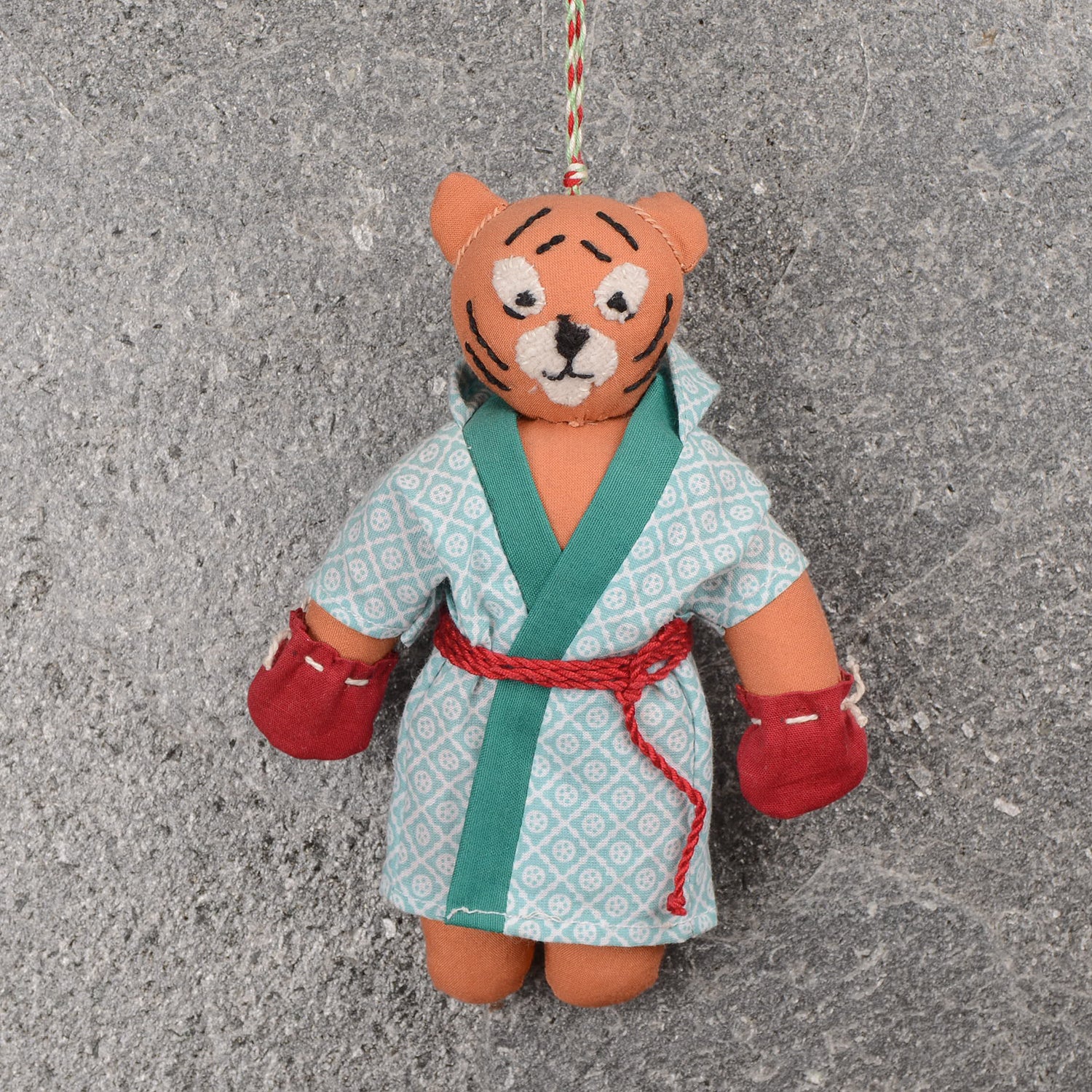 Kahali_01 eco-friendly handcrafted festival ornament made from upcycled fabric, showcasing vibrant colors and intricate design.