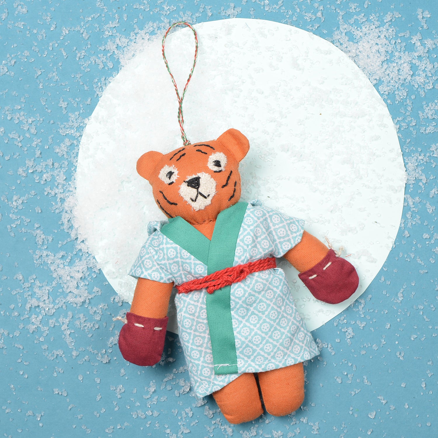 Kahali_01 eco-friendly handcrafted festival ornament made from upcycled fabric, showcasing vibrant colors and intricate design.