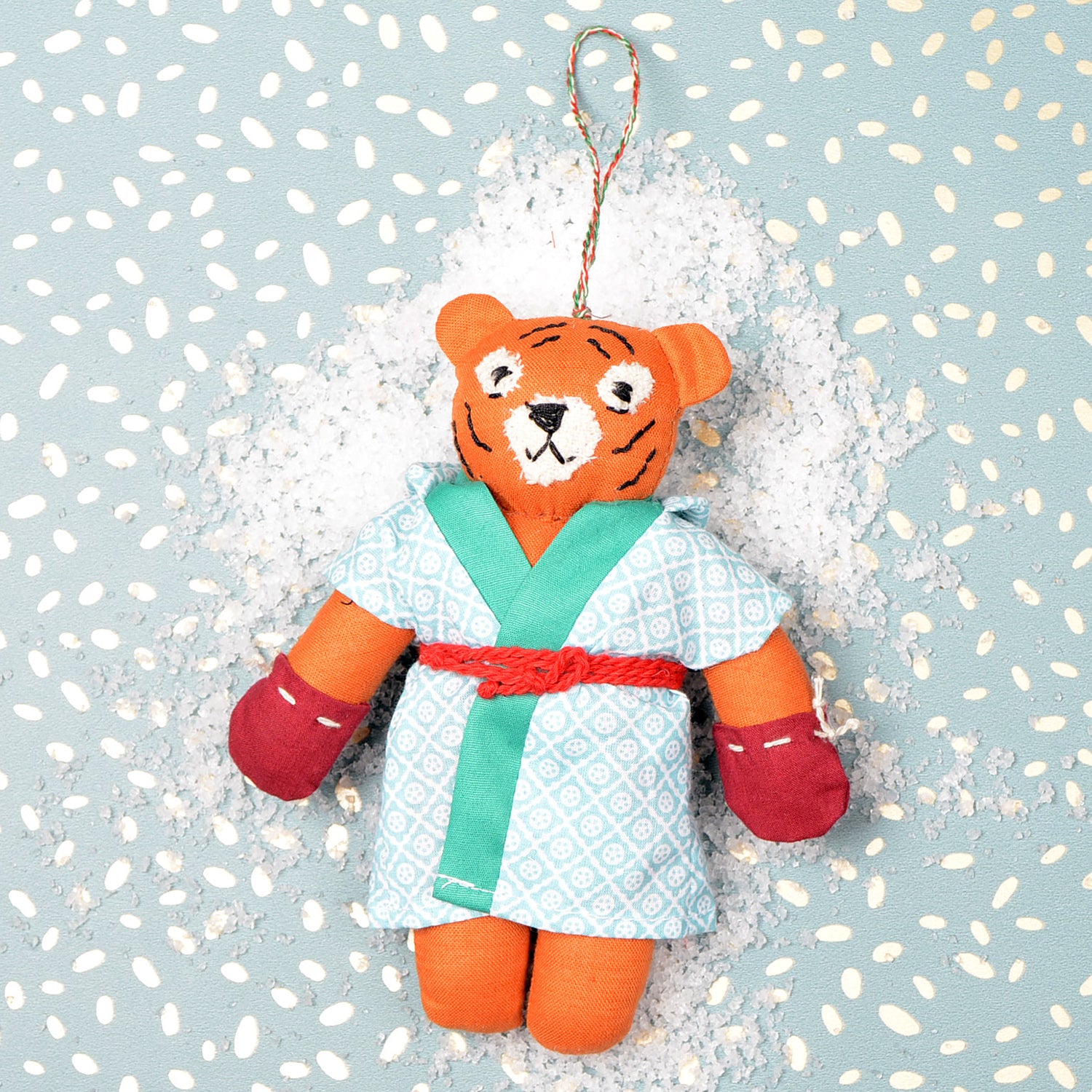 Kahali_01 eco-friendly handcrafted festival ornament made from upcycled fabric, showcasing vibrant colors and intricate design.