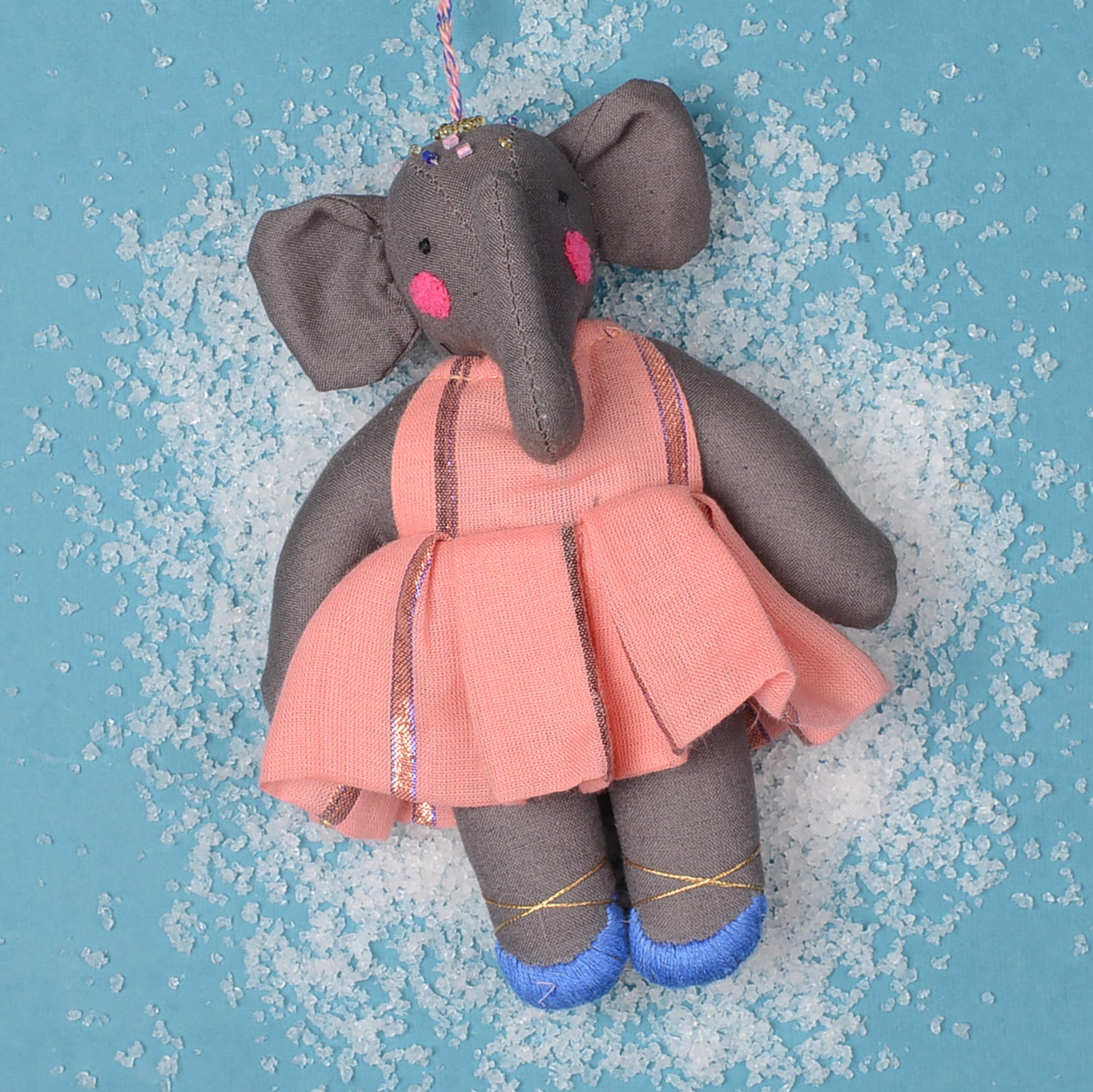 Kamal_01 handcrafted festival ornament made from upcycled waste fabric, featuring vibrant colors and intricate designs.