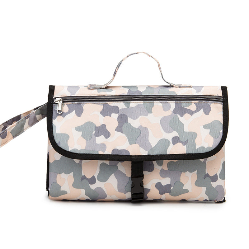 Multifunction Travel Waterproof Portable Diaper Change Pad in stylish design, featuring multiple pockets for organization and a waterproof surface.