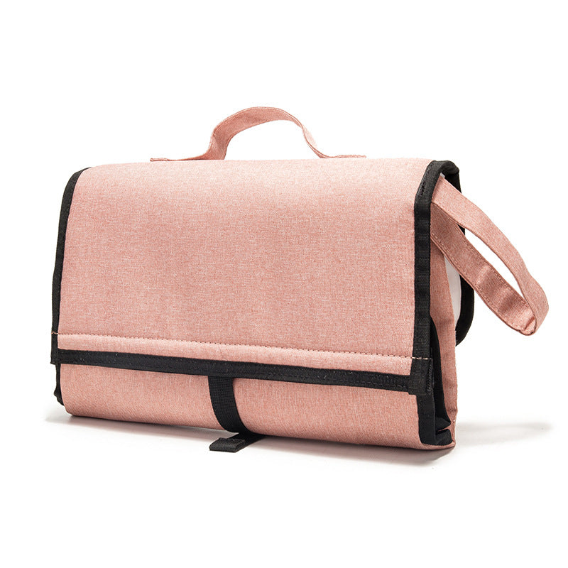 Multifunction Travel Waterproof Portable Diaper Change Pad in stylish design, featuring multiple pockets for organization and a waterproof surface.