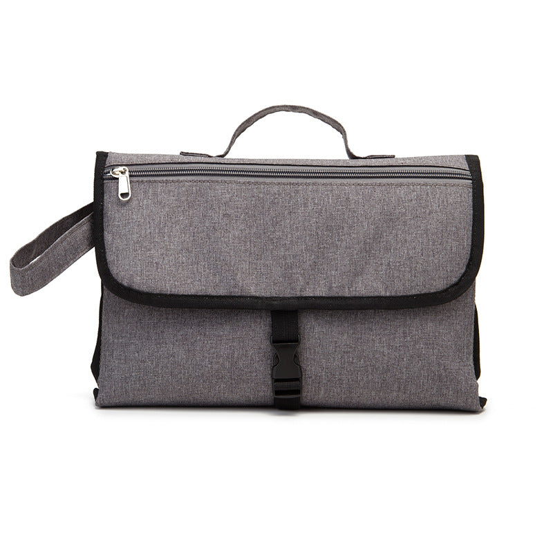 Multifunction Travel Waterproof Portable Diaper Change Pad in stylish design, featuring multiple pockets for organization and a waterproof surface.