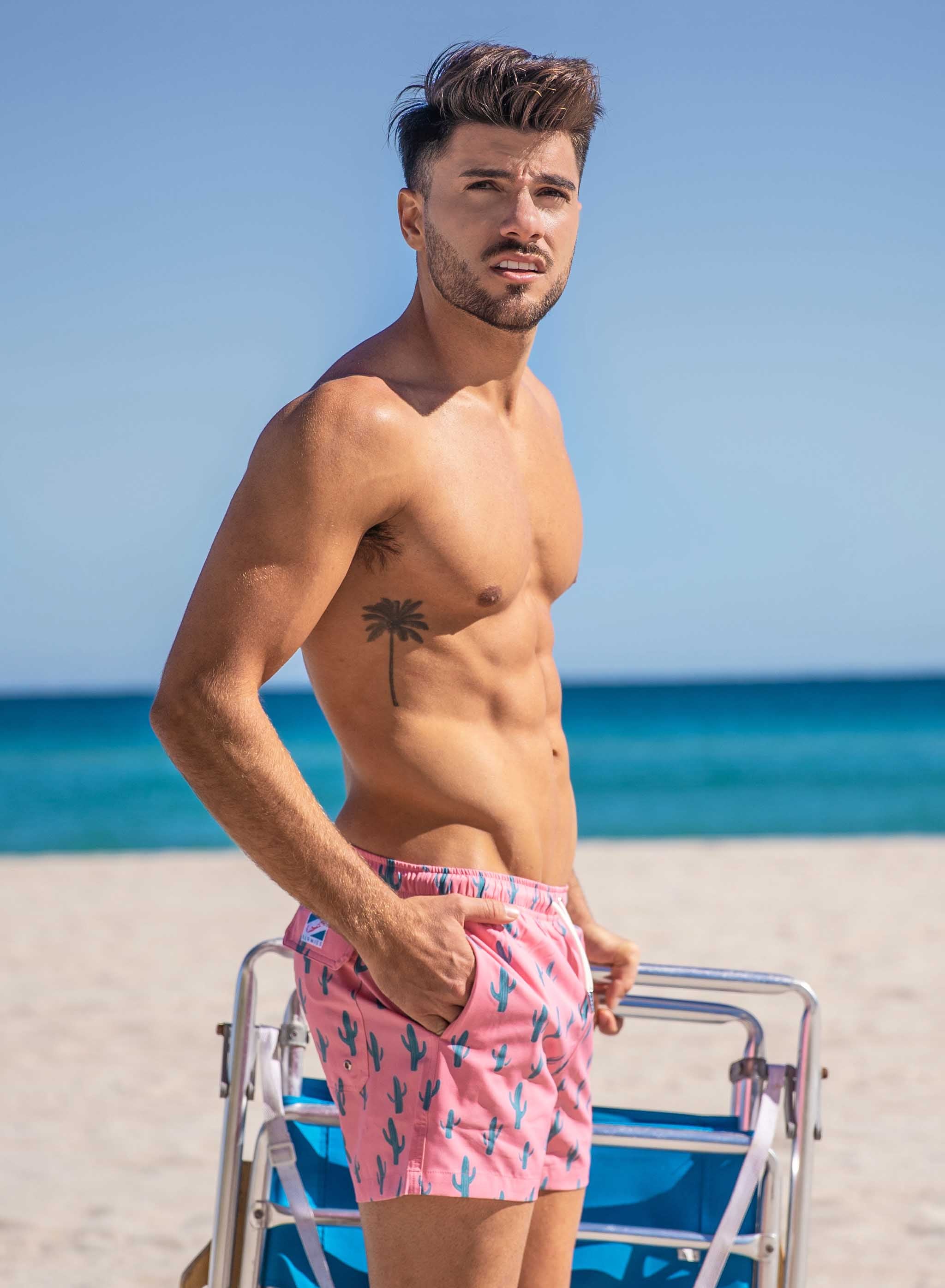 Cactus 2.0 swim trunks featuring a vibrant design, made from recycled materials, showcasing pockets and a comfortable mesh liner.