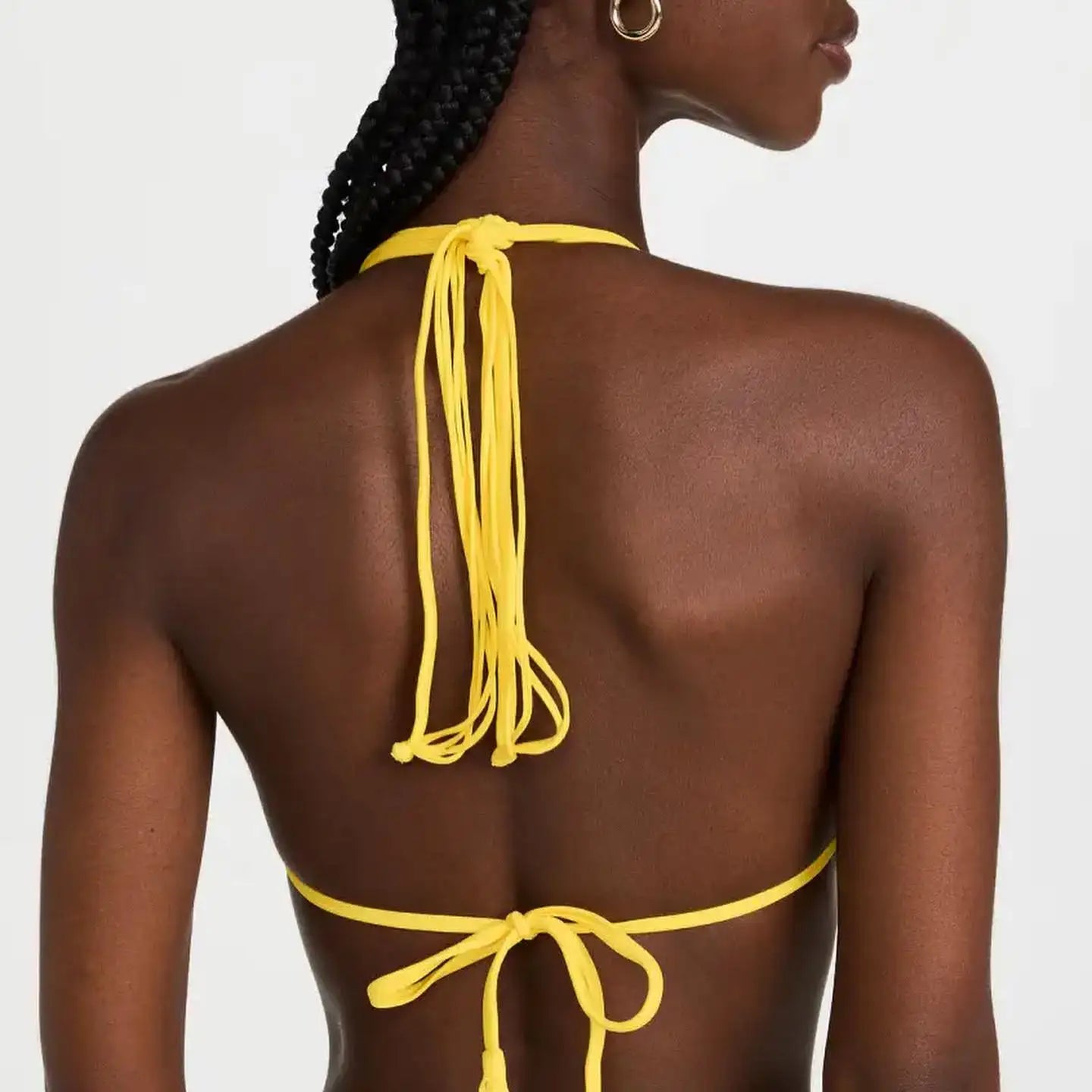 Cove two piece swimsuit featuring a stylish solid design, perfect for beach and pool activities, made from durable polyester material.