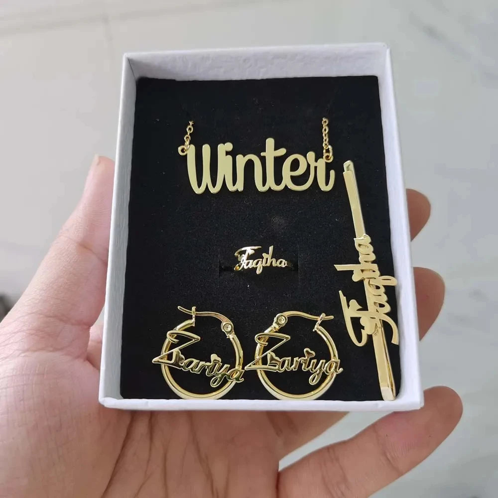 Cute mini personalized jewelry set featuring a heart design, made of stainless steel, includes necklace, earrings, and bracelet in gold, silver, and rose gold.