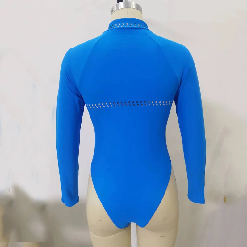 Dolphin one piece swimsuit by Sexikinis Swim, featuring a high waist and padded design, perfect for middle-aged women.