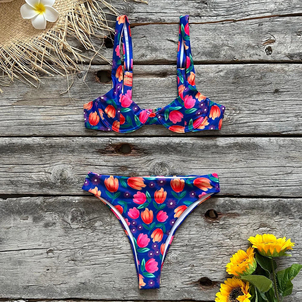 Floral Funky two piece swimsuit by Sexikinis Swim featuring vibrant floral patterns and a trendy low waist cut.
