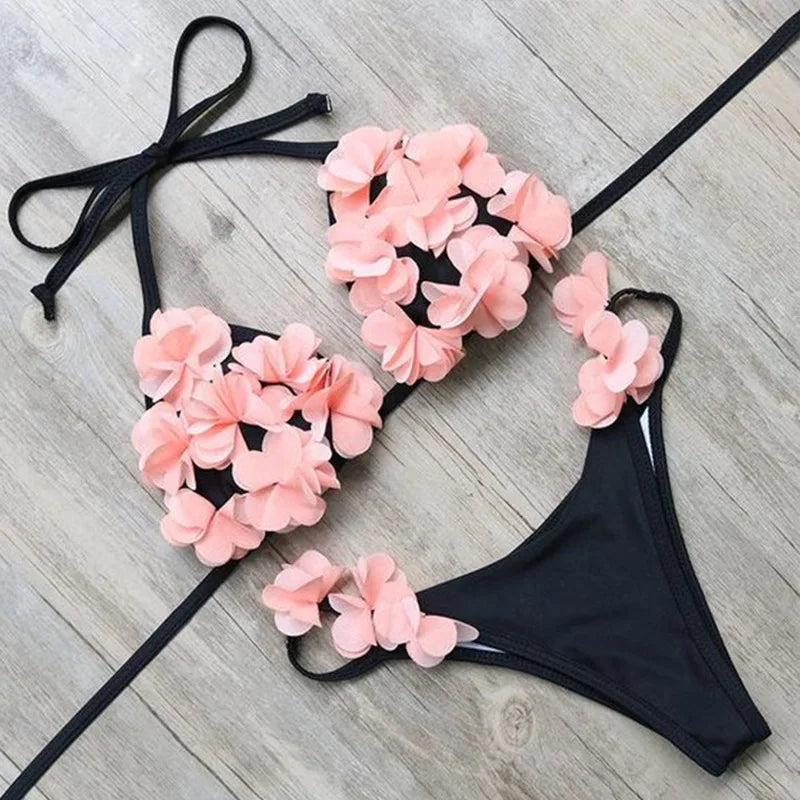 Flowa Diva Two-piece swimsuit featuring a vibrant floral pattern, made from high-quality polyester and rayon, perfect for beach and pool outings.