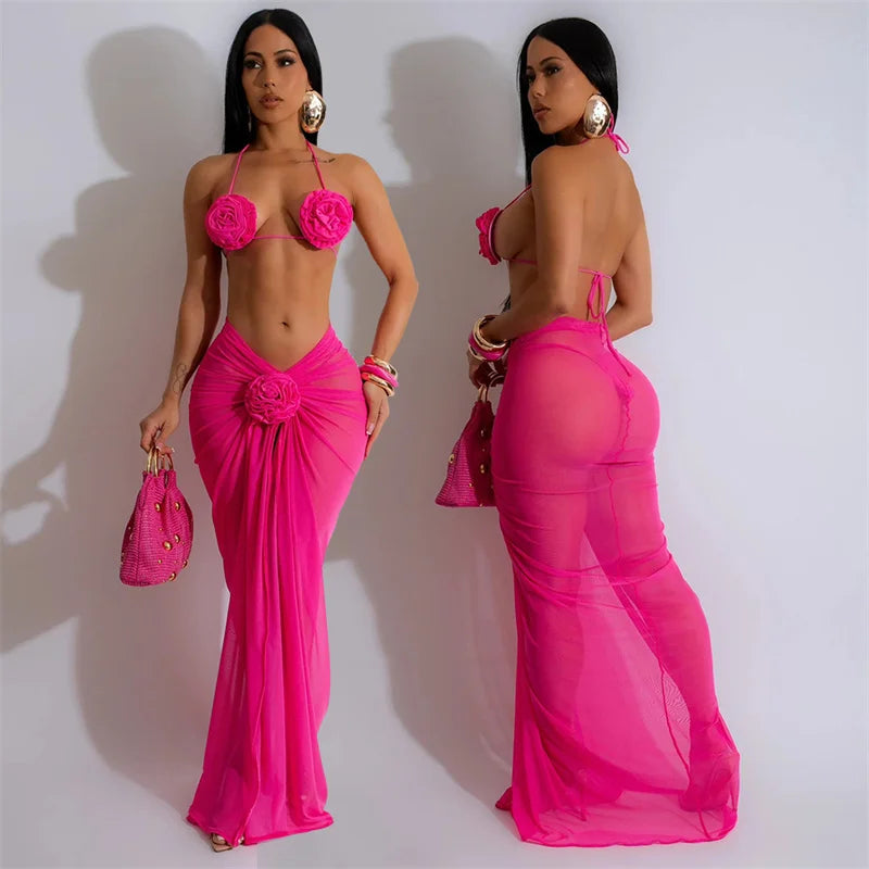 A vibrant three piece swimsuit set featuring a stylish low waist design, made from all-natural materials, perfect for summer beach outings.