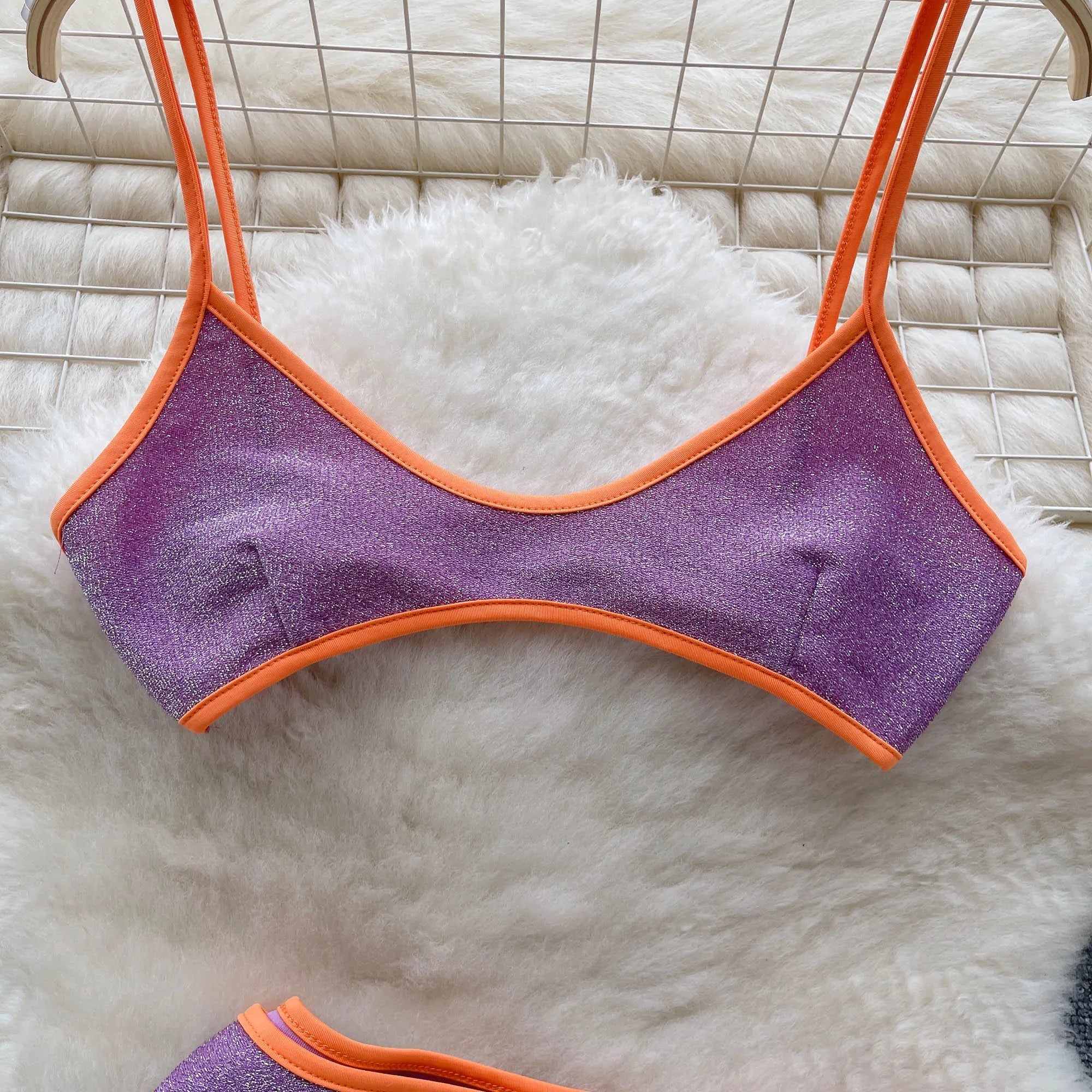 Hennie High Waist Two Piece Swimsuit featuring stylish buttons, pockets, and a modern V-neck collar, perfect for summer outings.