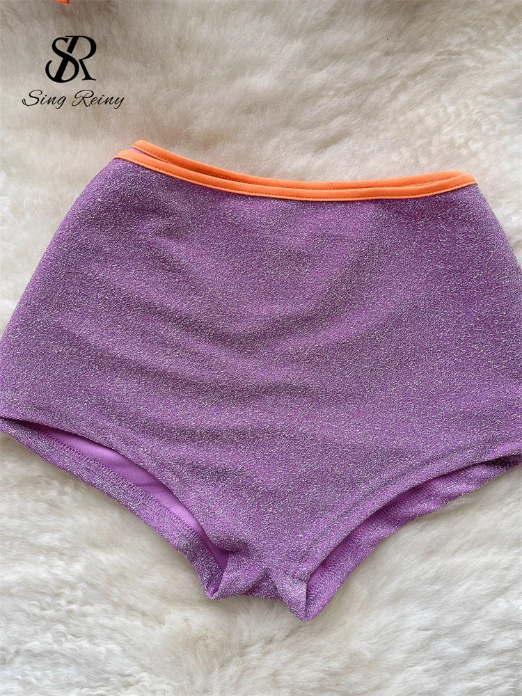 Hennie High Waist Two Piece Swimsuit featuring stylish buttons, pockets, and a modern V-neck collar, perfect for summer outings.