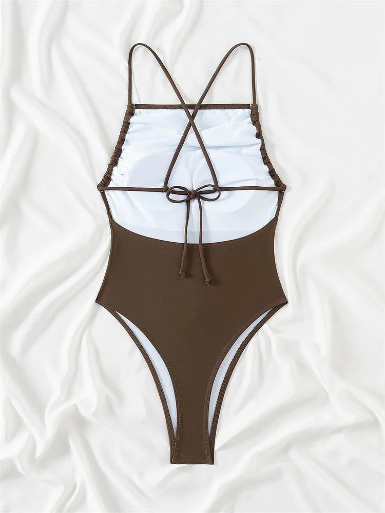 Lacy one piece swimsuit in various colors, showcasing its stylish design and comfortable fit for women.