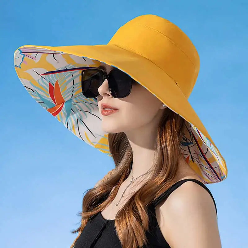 Large Brim Women Sun Hat in foliage print, made of breathable cotton, perfect for summer sun protection.