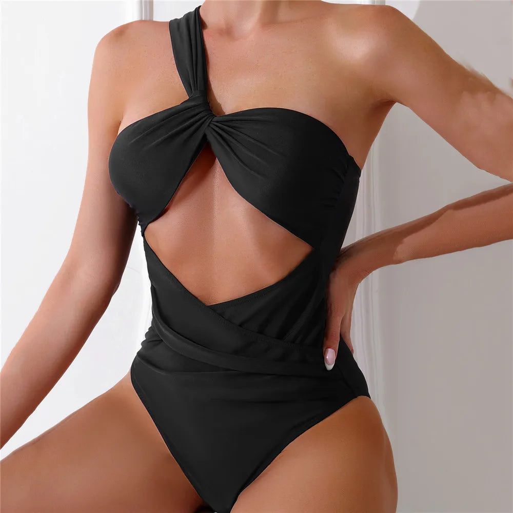 One Shoulder Sexy Black One Piece Swimsuit displayed on a mannequin, showcasing its elegant design and premium SPANDEX material.