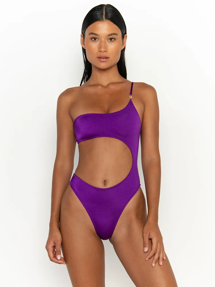 Onika one piece swimsuit featuring vibrant prints, designed for women, perfect for summer beachwear.