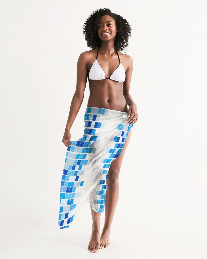 A stylish sheer swimsuit cover up featuring a blue and white mosaic pattern, perfect for beach or poolside wear.