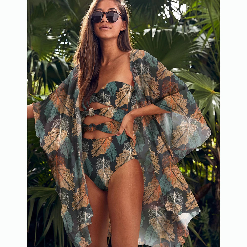 A vibrant yellow-green one piece swimsuit with a leaf print pattern, designed for women, perfect for beach and pool activities.