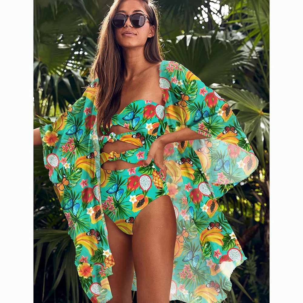 A vibrant yellow-green one piece swimsuit with a leaf print pattern, designed for women, perfect for beach and pool activities.