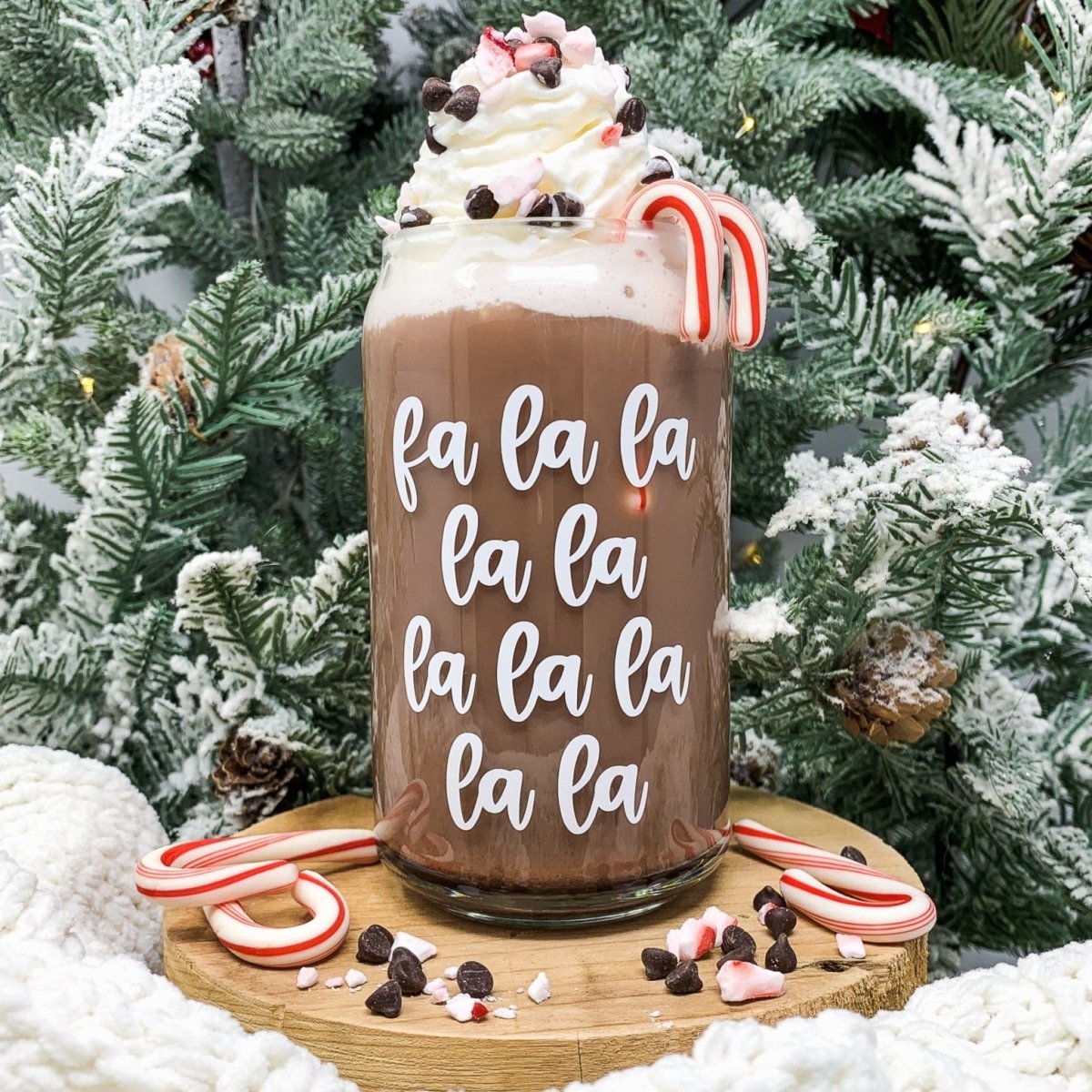 A stylish 16 oz Beer Can Glass with a clear design and unique vinyl decoration, perfect for serving cold beverages.