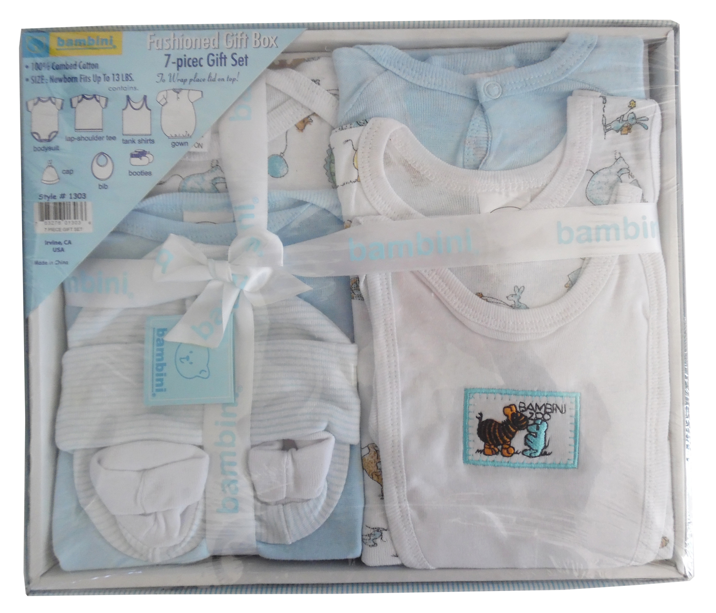 7 Piece Gift Box in pastel blue for newborns, includes t-shirt, bodysuit, bib, hat, tank top, gown, and booties, all made from soft cotton.