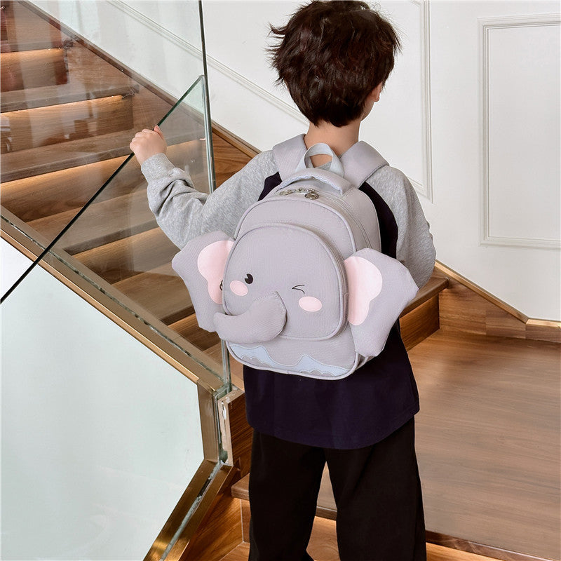Adorable Cartoon Elephant Design Canvas Backpack in vibrant colors for kids, featuring adjustable straps and spacious interior.