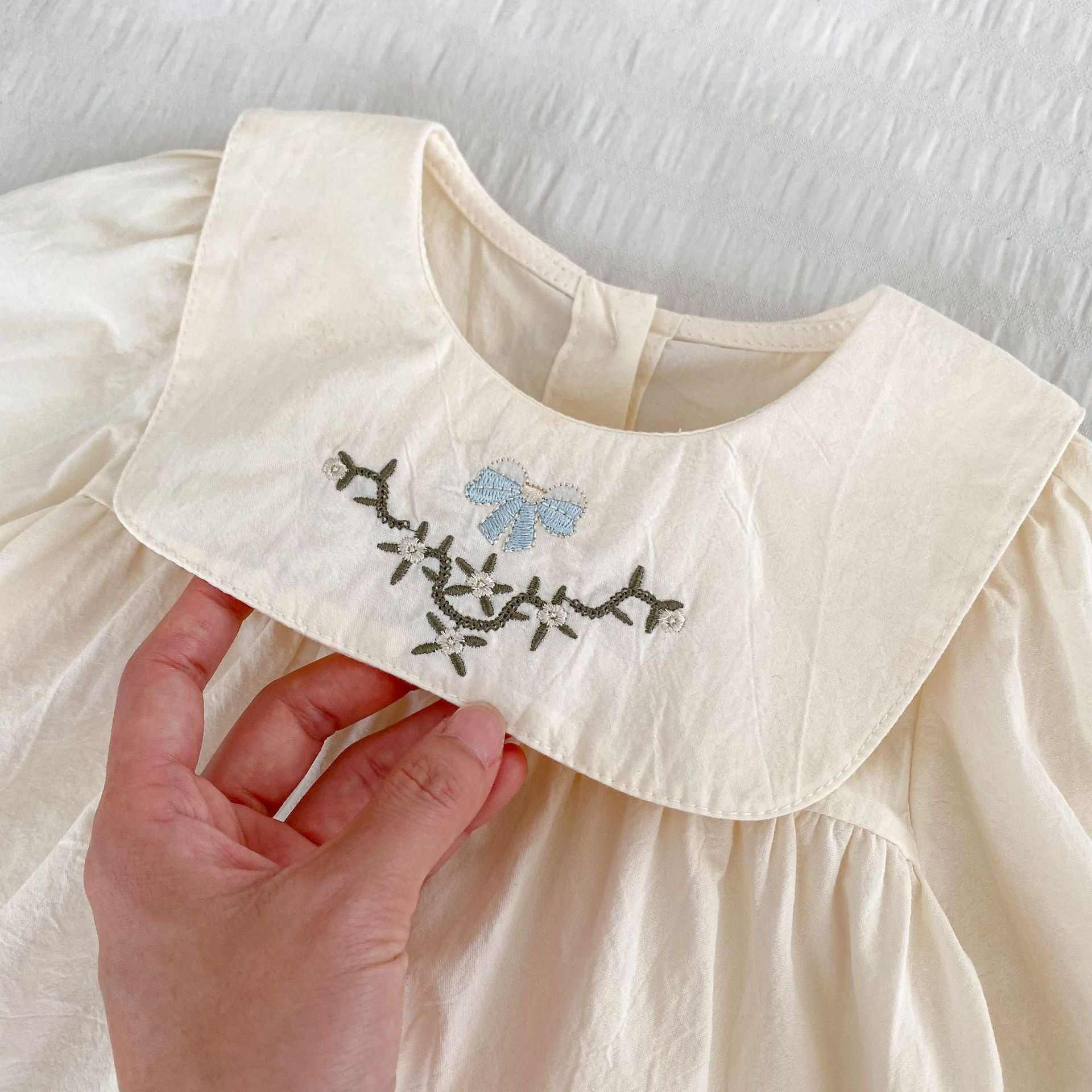 Arrival Autumn Baby Girls Long Sleeves Top in white and beige with simple embroidery, perfect for spring and autumn wear.