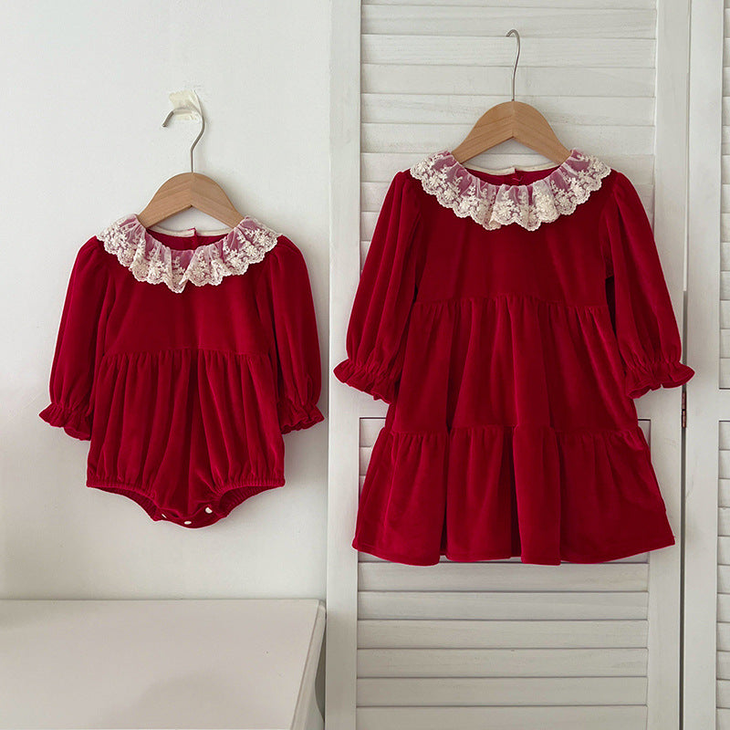 A stylish patchwork long sleeve top for baby girls featuring a lace trim collar, available in red and pink colors.