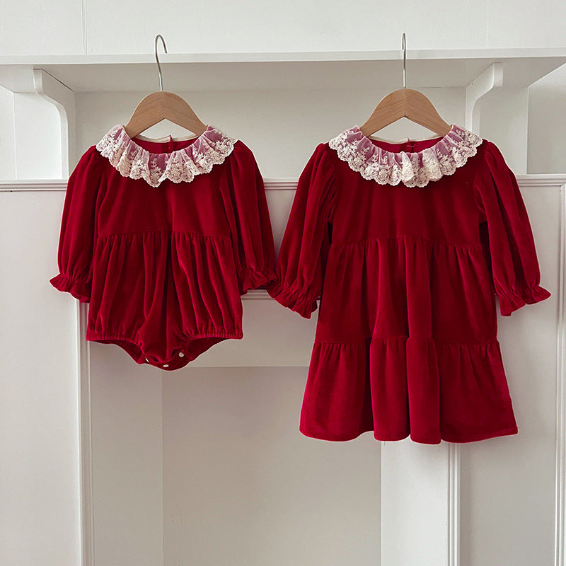 A stylish patchwork long sleeve top for baby girls featuring a lace trim collar, available in red and pink colors.