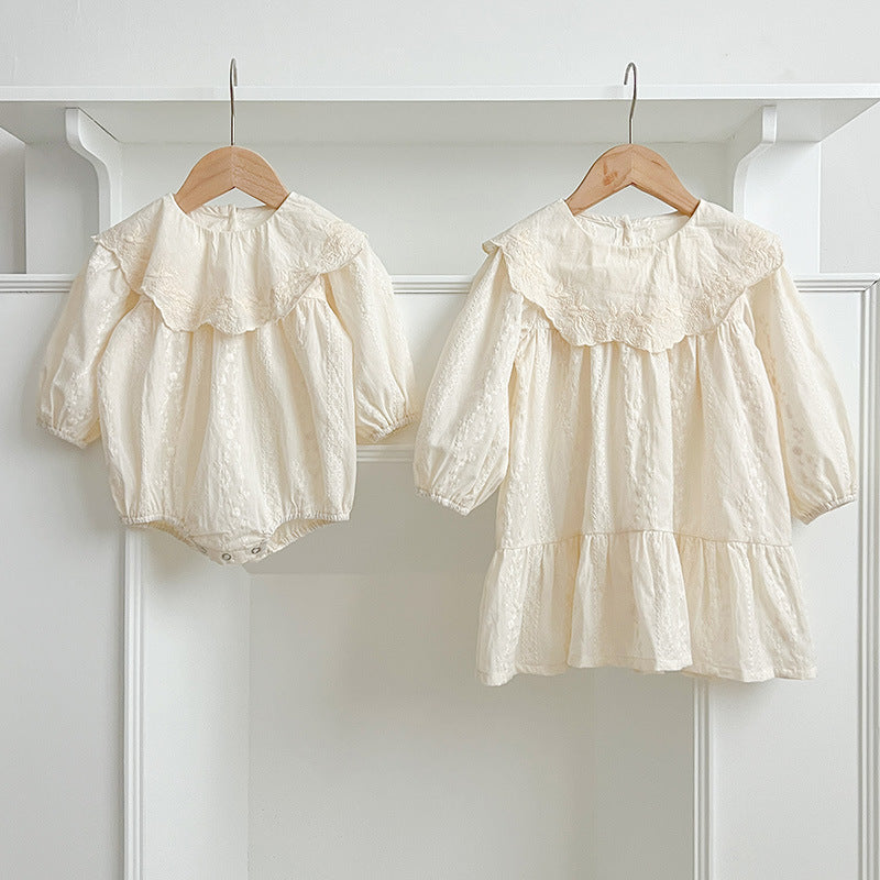 A collection of Arrival Autumn Baby Kids Girls outfits in beige and apricot colors featuring floral and geometric designs, made from soft cotton.