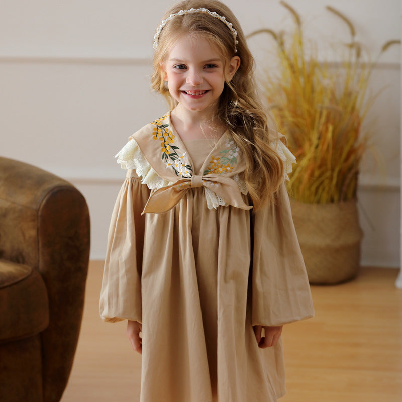 A stylish khaki long-sleeve collar dress for girls featuring beautiful floral embroidery, perfect for autumn and spring seasons.