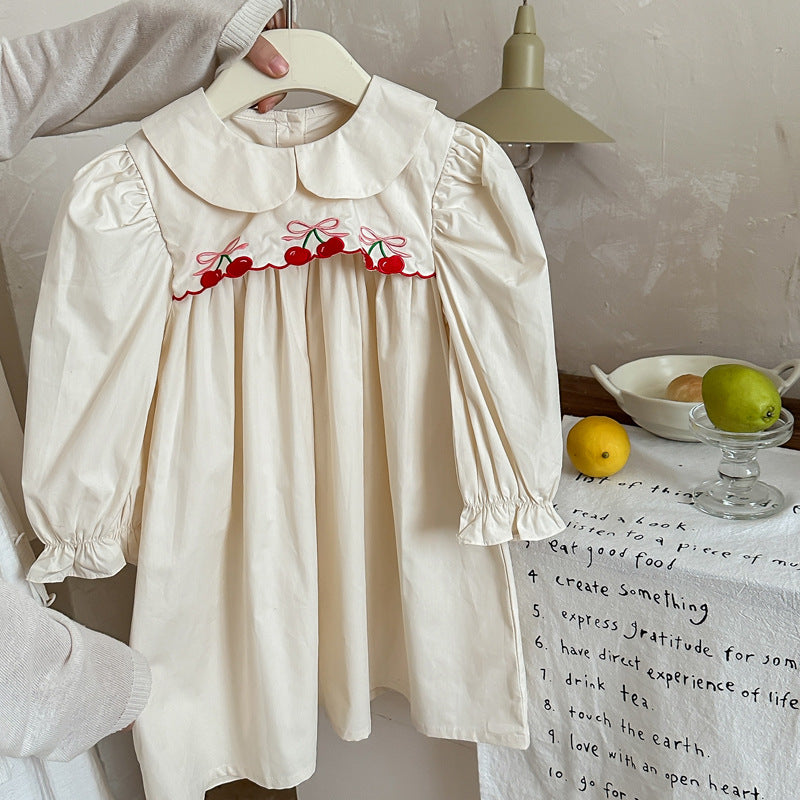 Arrival Autumn Girls Cherry Embroidery Long Sleeves Peter Pan Collar dress in pink and apricot colors, featuring a charming cherry design.