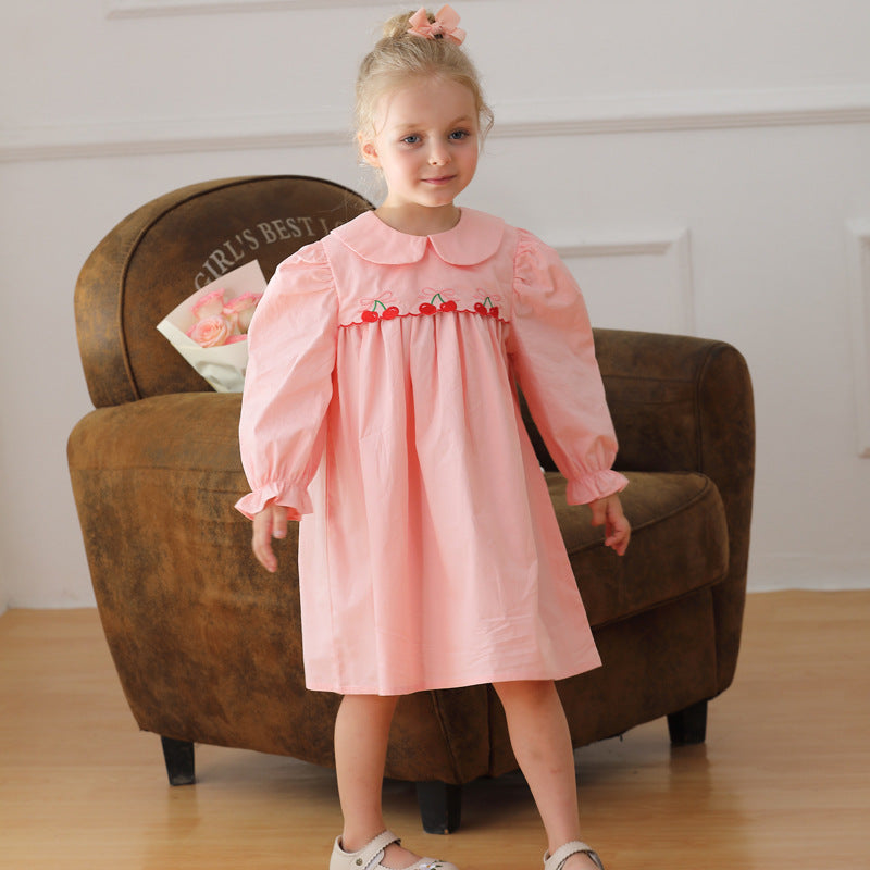 Arrival Autumn Girls Cherry Embroidery Long Sleeves Peter Pan Collar dress in pink and apricot colors, featuring a charming cherry design.