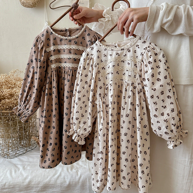 A stylish beige and coffee floral patterned long sleeve top for girls featuring a vintage ruffle neck design, perfect for autumn wear.
