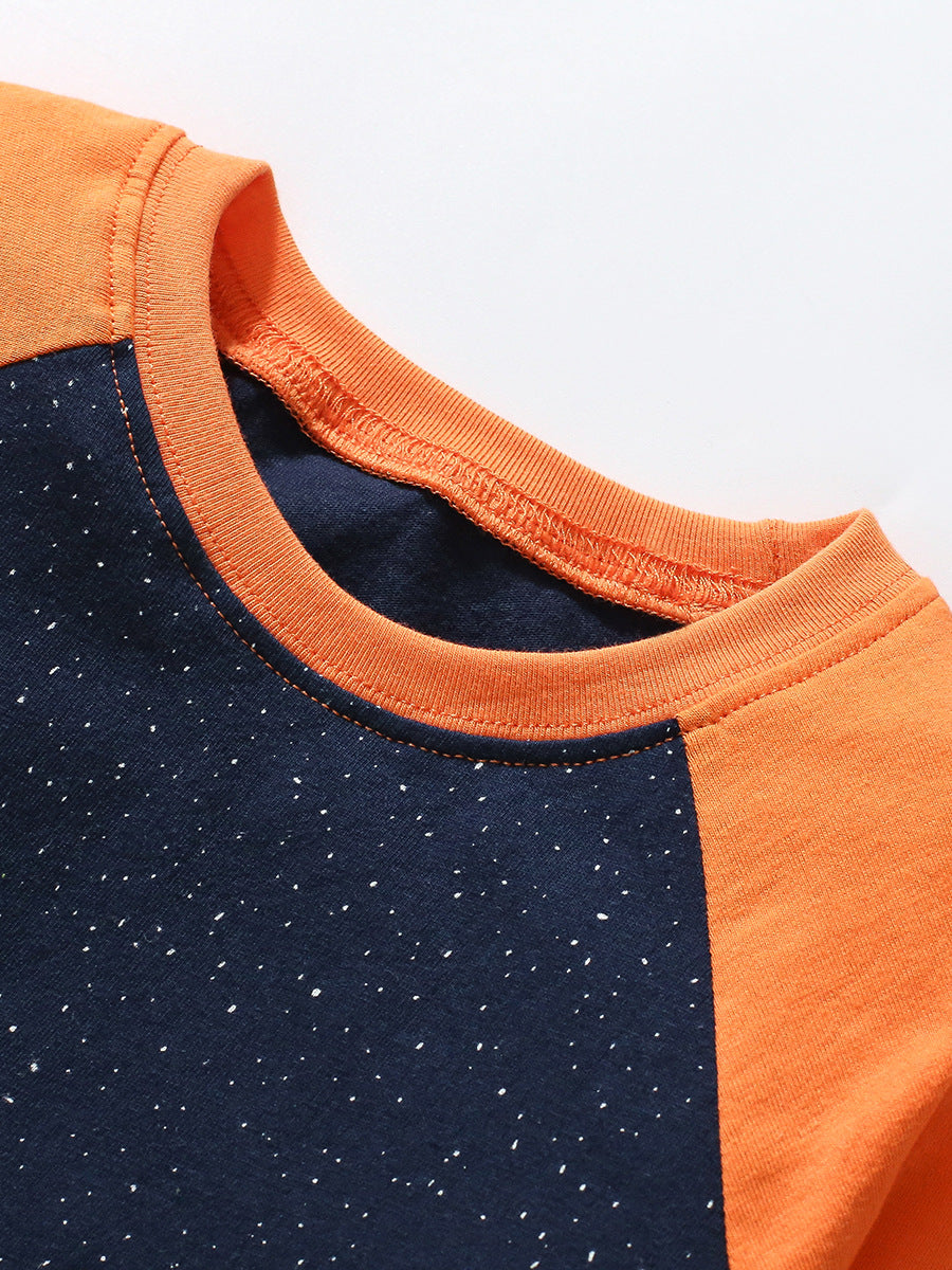 Navy blue cotton kids' outfit featuring a rocket and universe cartoon pattern appliqué, perfect for autumn and spring wear.