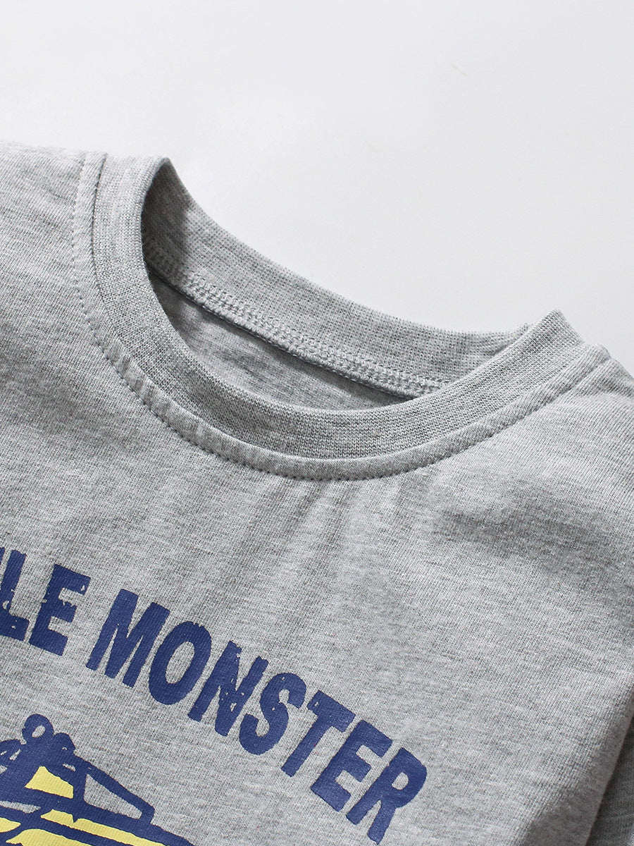 Grey long sleeves t-shirt for kids featuring a cartoon vehicle pattern, made from soft cotton material, suitable for spring and autumn wear.