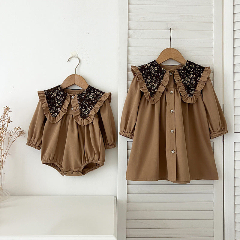 A vintage floral embroidered collar for baby girls, featuring soft cotton material in brown and coffee colors, perfect for autumn wear.