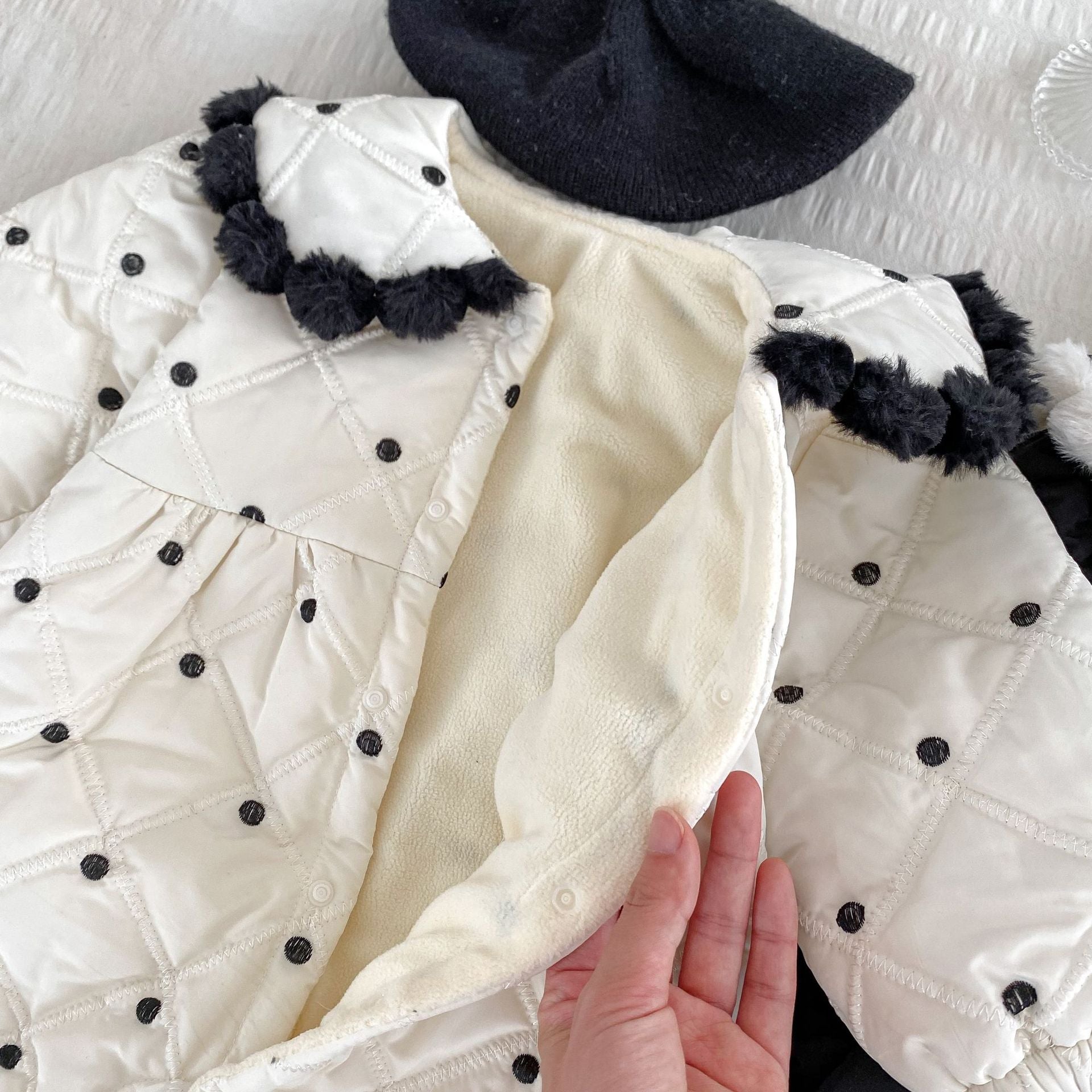Arrival Baby Girls Dots Pattern Thick Romper in black and beige, featuring a cute dots design and single-breasted closure.