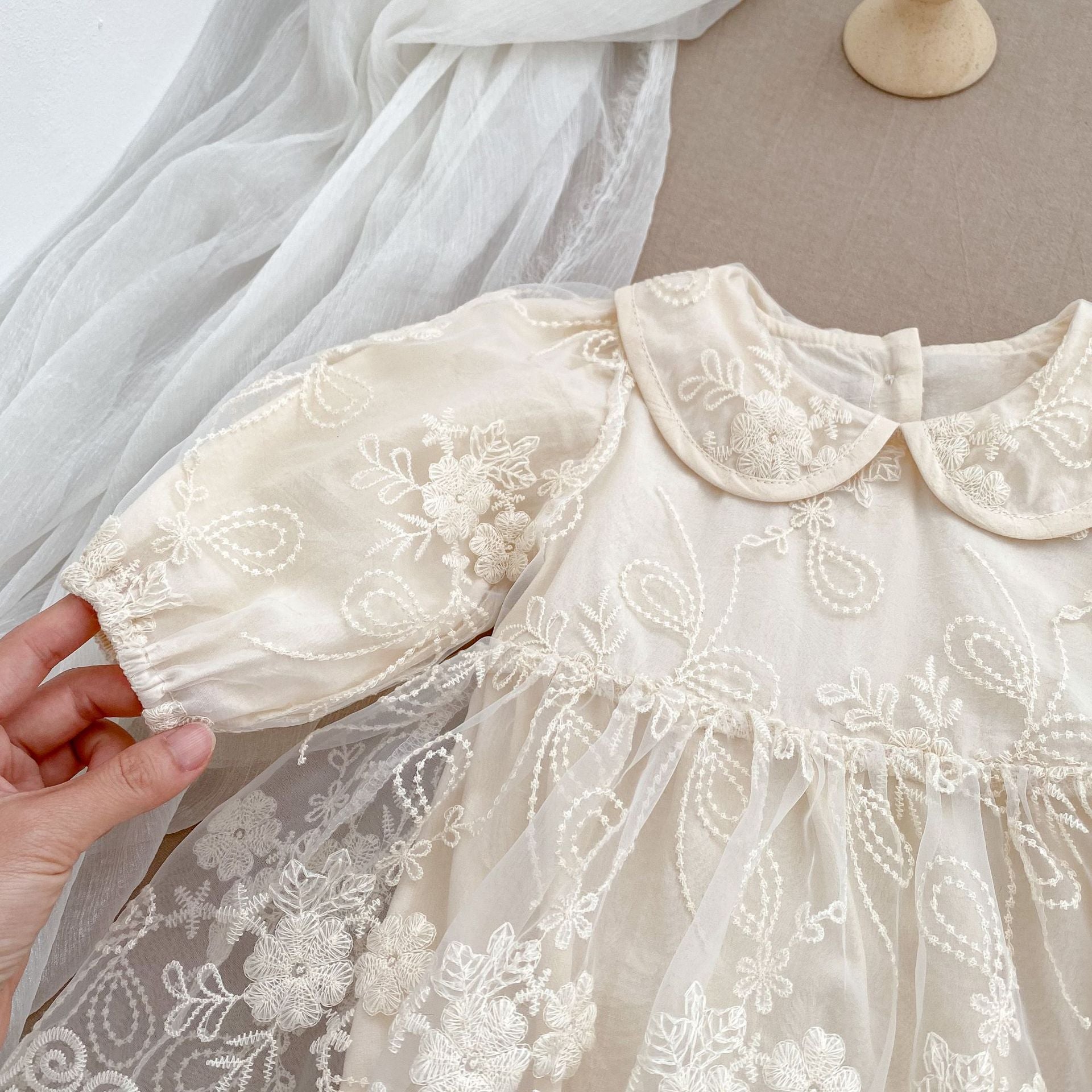 Arrival Baby Girls Long Sleeves Dress in beige with floral embroidery and tulle overlay, perfect for spring and autumn.