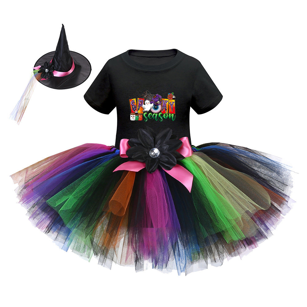 Arrival Girls’ Halloween Costume featuring short sleeves and cartoon print witches in vibrant colors.
