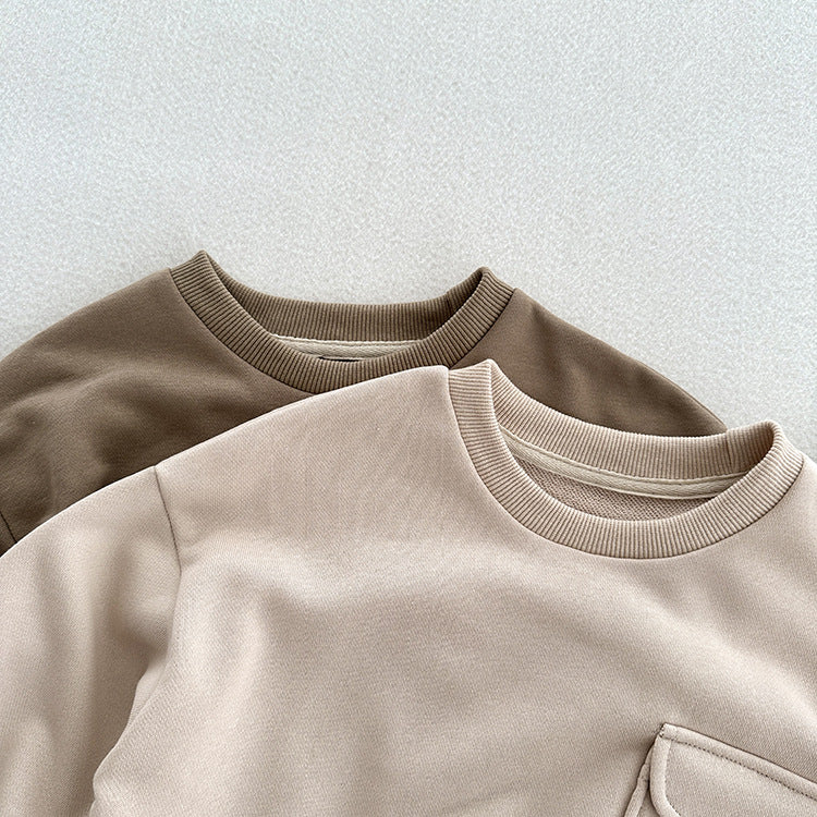 A soft and comfortable unisex long sleeves top for kids in khaki and beige colors, made from cotton fabric.