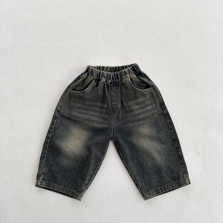 A stylish unisex vintage blue denim outfit for kids, featuring an elastic waistband and made from soft cotton denim, perfect for spring and autumn.