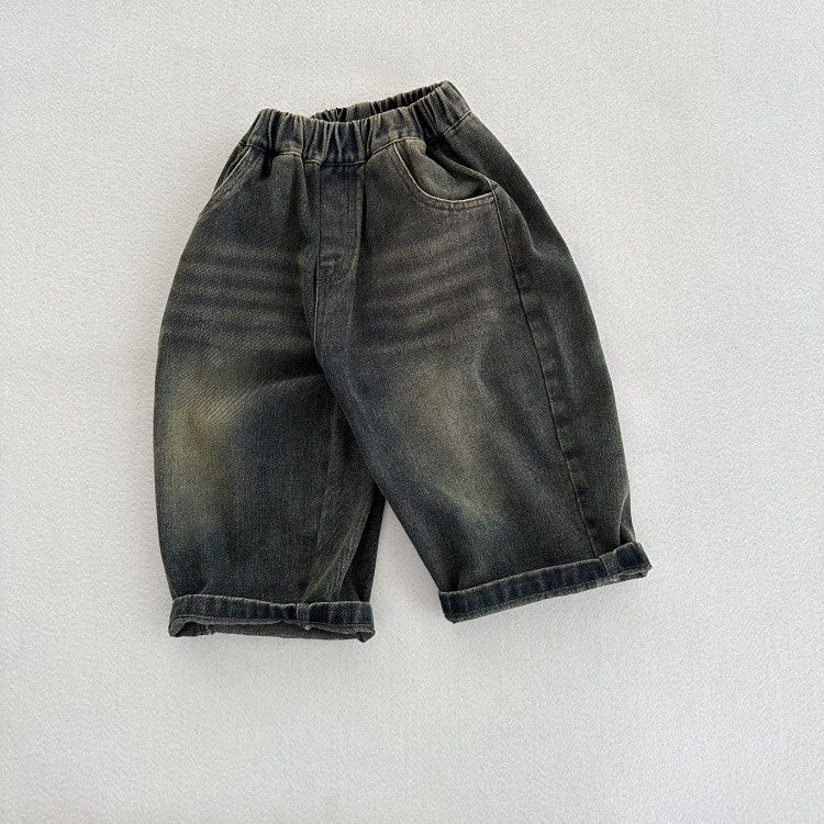 A stylish unisex vintage blue denim outfit for kids, featuring an elastic waistband and made from soft cotton denim, perfect for spring and autumn.