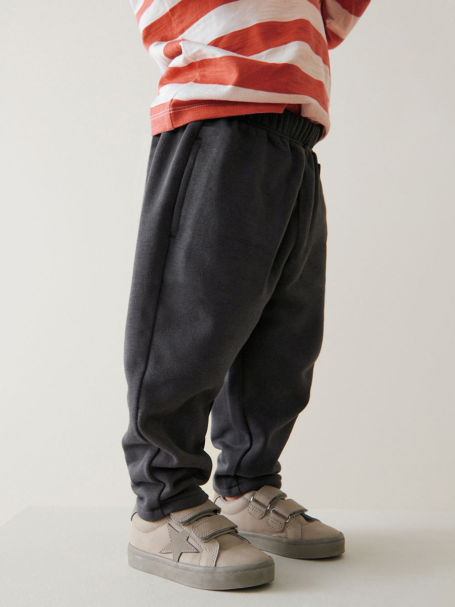 A vibrant red boys' casual outfit featuring appliqué embroidery of a lion, made from soft cotton, perfect for spring and autumn wear.