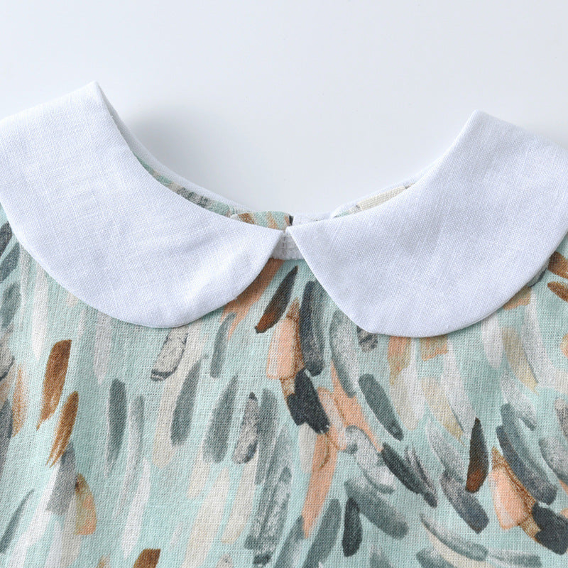 Colorful sleeveless dress for girls with Peter Pan collar and geometric pattern, perfect for summer wear.