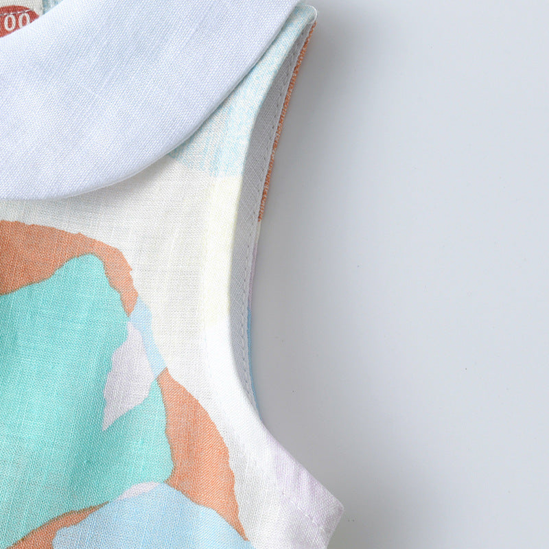 Colorful sleeveless dress for girls with Peter Pan collar and geometric pattern, perfect for summer wear.