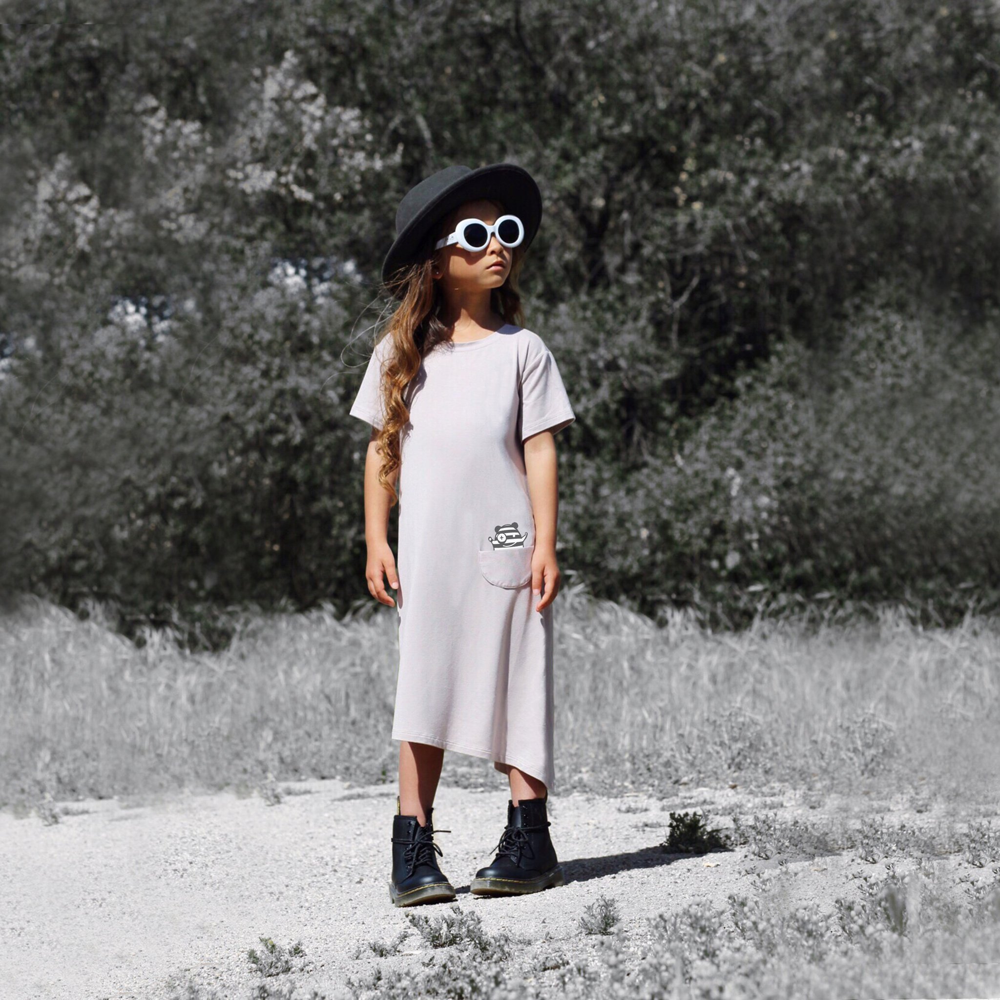 Asymmetric T-shirt Dress in Mocha featuring a monster peek-a-boo pocket and unique hem design, perfect for young girls.