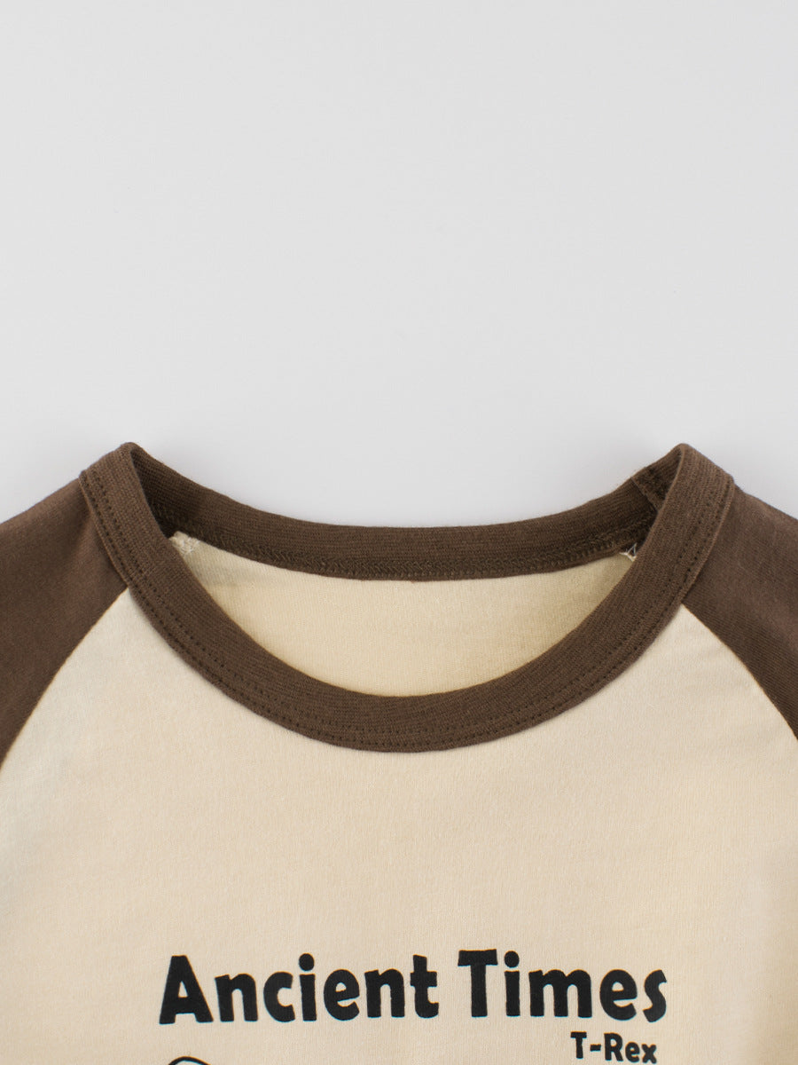 Autumn Baby Boys outfit featuring dinosaur and letter prints in color patchwork design, made from soft cotton material.